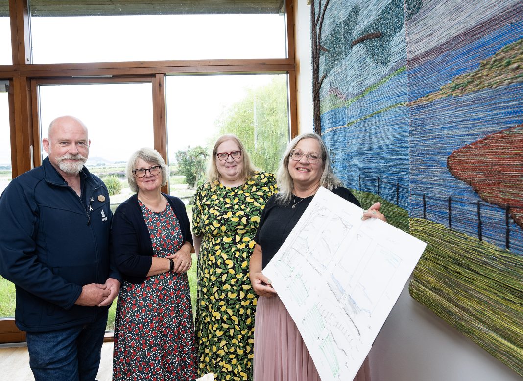 Paul Stewart, WWT Castle Espie Centre Manager, Dr Sally Montgomery, Northern Ireland Committee Member at The National Lottery Heritage Fund, Claire Anketell, Director of Inspiring Yarns CIC and Creative Director Åsa McDowell, who composed and designed the four large panels.